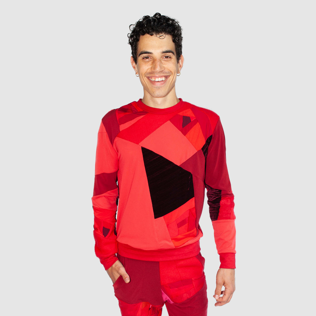 red 'all-over reroll' sweatshirt