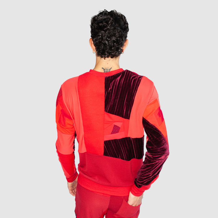red 'all-over reroll' sweatshirt