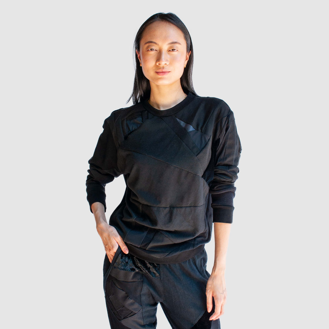 black 'all-over reroll' sweatshirt
