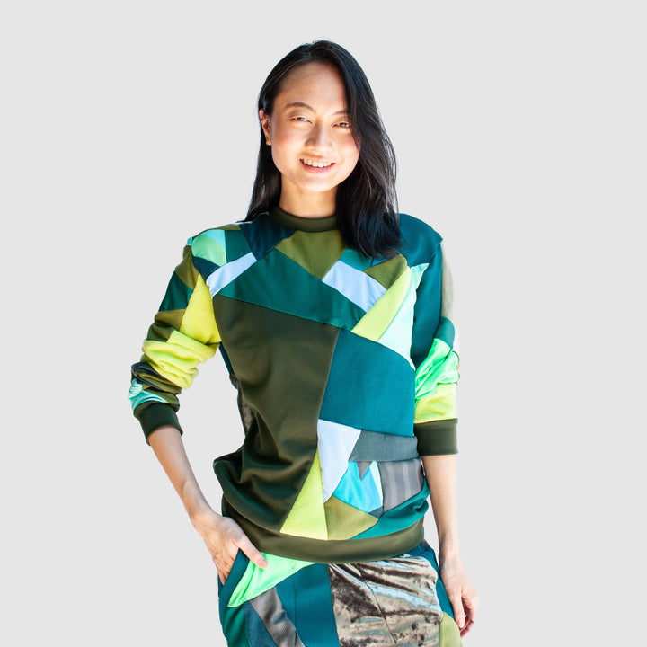 green 'all-over reroll' sweatshirt