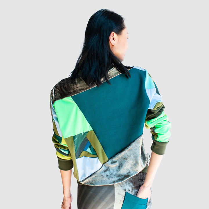 green 'all-over reroll' sweatshirt