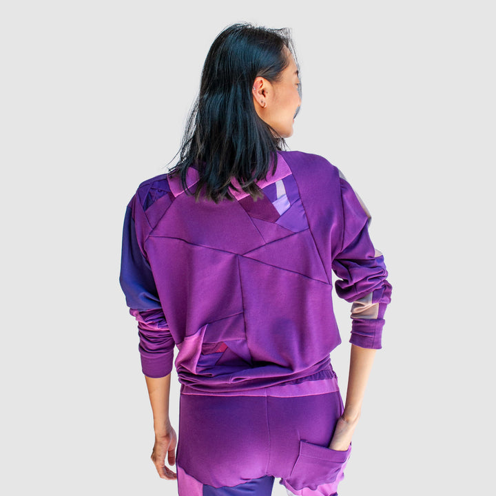 purple 'all-over reroll' sweatshirt